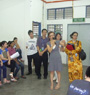 Dr Christina training the volunteers at the Community hall