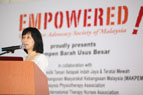 Ms.Chui Ping Lei, a senior nurse, educating the participants about EMPOWERED's cancer screening and support program